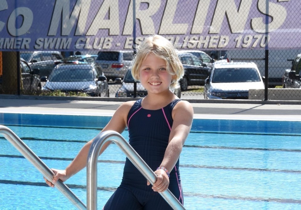 emma-feichtinger-gets-ready-to-swim-in-port-coquitlam